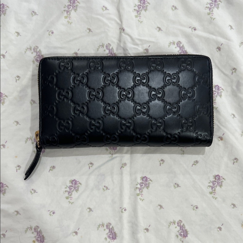 Gucci Imprint Zip Around Leather Zip Wallet. Gold zipper. Excellent condition.